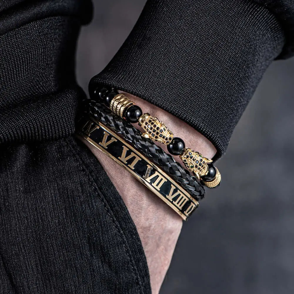 Luxury men's bracelet set with Leopard and Roman numerals, gold accents worn on wrist